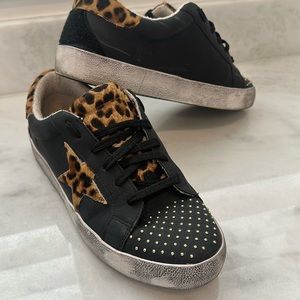 Kellparker Holy Stud. Distressed, leopard fur, leather gold studded tennis shoes